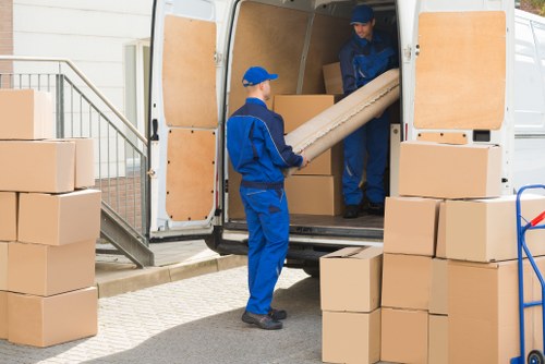 Person using an accessible removals website on a laptop