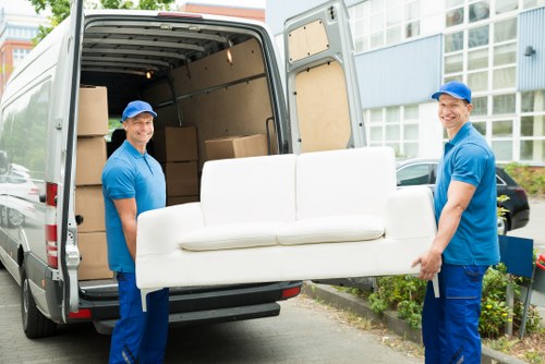 Removal team preparing equipment with safety awareness before a move