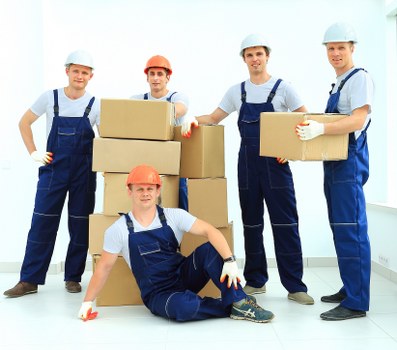 Loading furniture into a removal truck