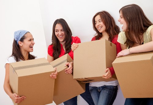 Neatly packed storage unit with labelled boxes and furniture