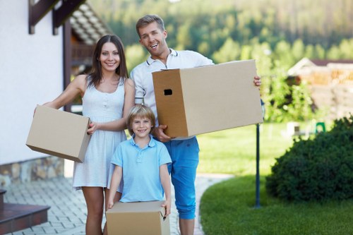 Local flat removals service loading belongings for transport in Havering