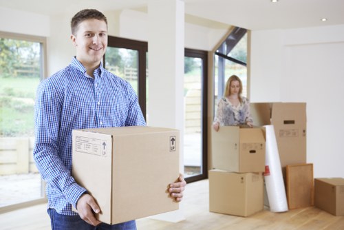 Customer booking a removals service with paperwork and moving checklist