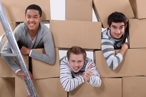 Moving team in Havering organizing fragile household belongings