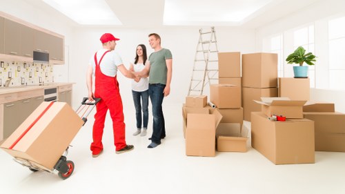 Staff assessing hazards and planning a safe removals operation