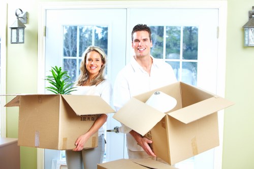 Supervisor assessing a moving service complaint in an office