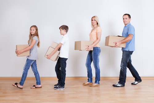 Professional moving crew handling belongings during a Havering relocation