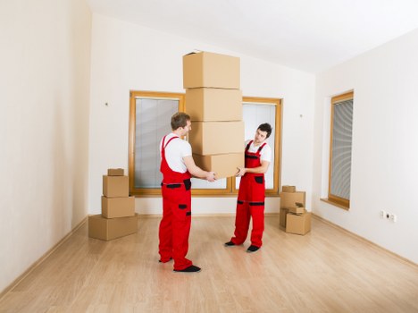 Careful unpacking service in Havering arranging items in a new home
