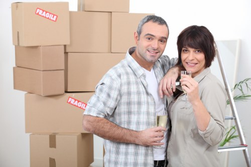 Professional moving van transporting boxes in Havering